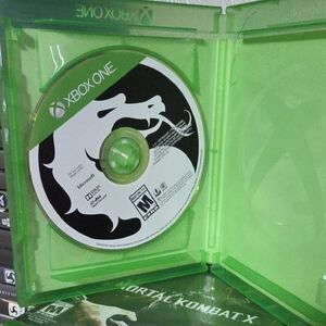One Mortal Kombat X Game Disc - Green Case